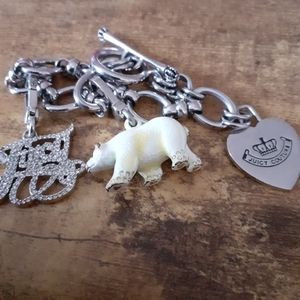 Juicy Couture charm bracelet with polar bear charm and juicy charm